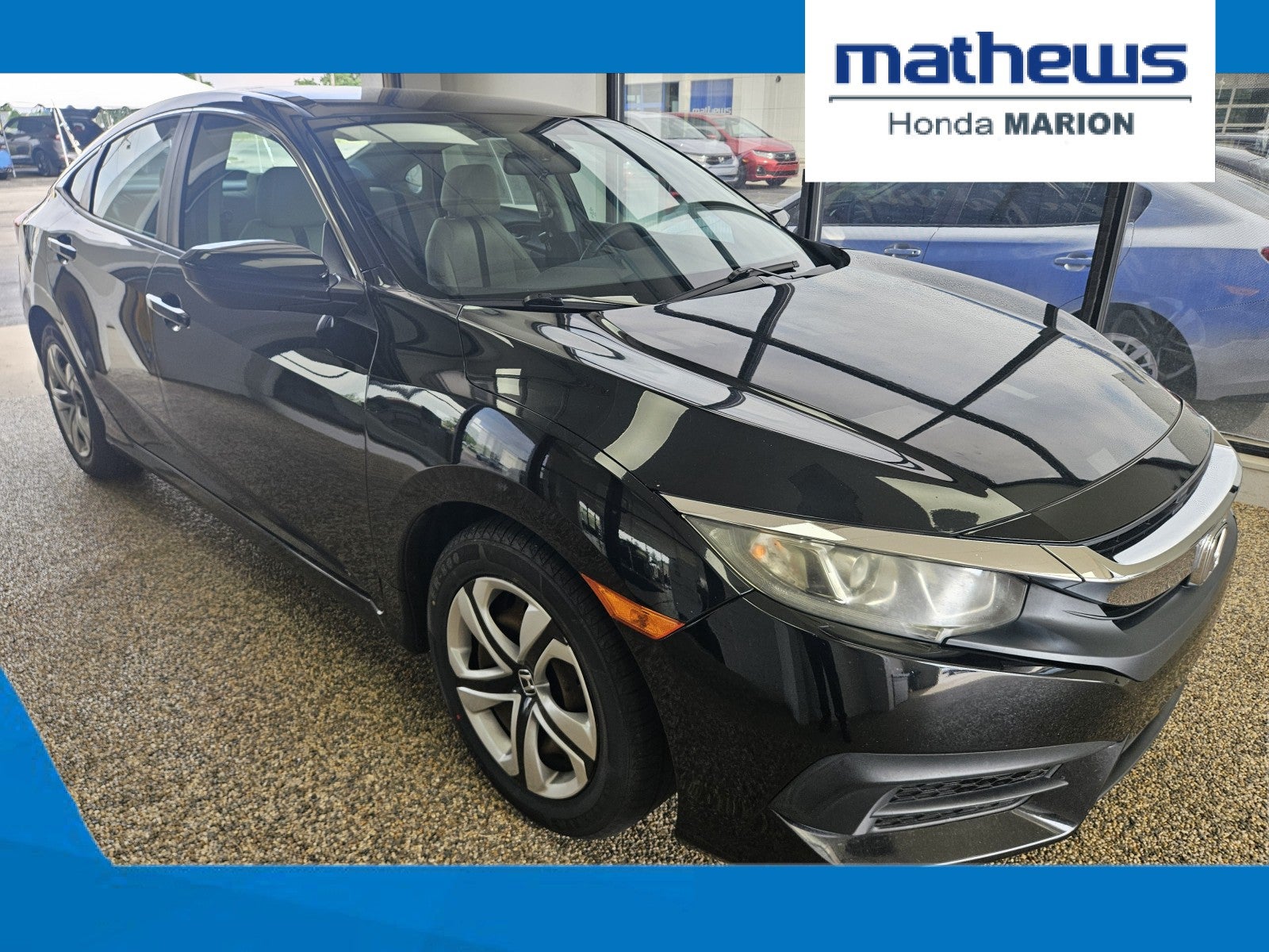 2016 Honda Civic Sedan LX in Crystal Black Pearl — front three-quarter view