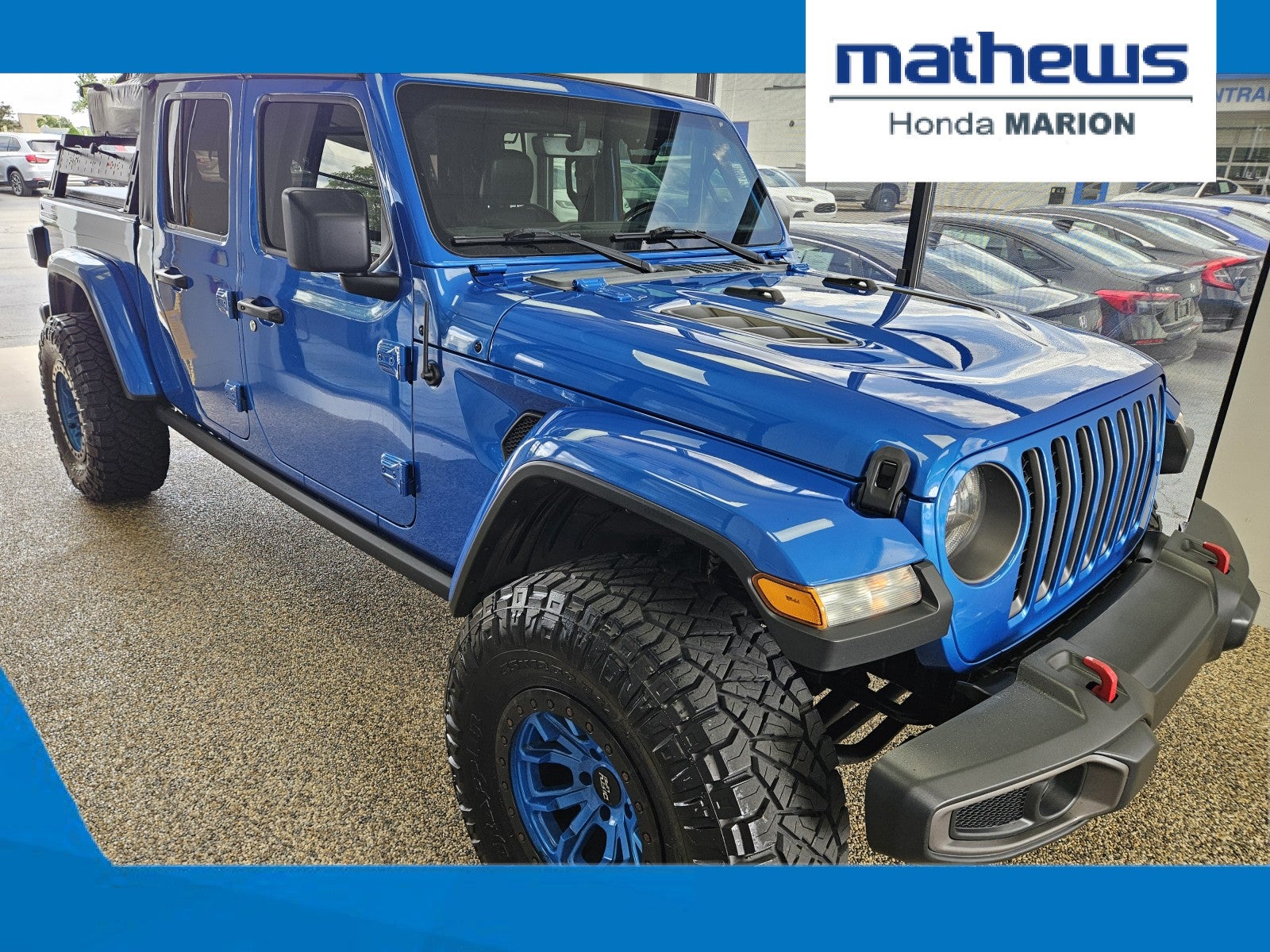 2020 Jeep Gladiator Rubicon in Hydro Blue Pearlcoat — front three-quarter view