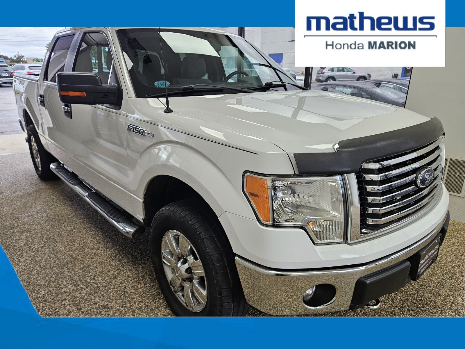 2012 Ford F-150 XLT in Oxford White — front three-quarter view