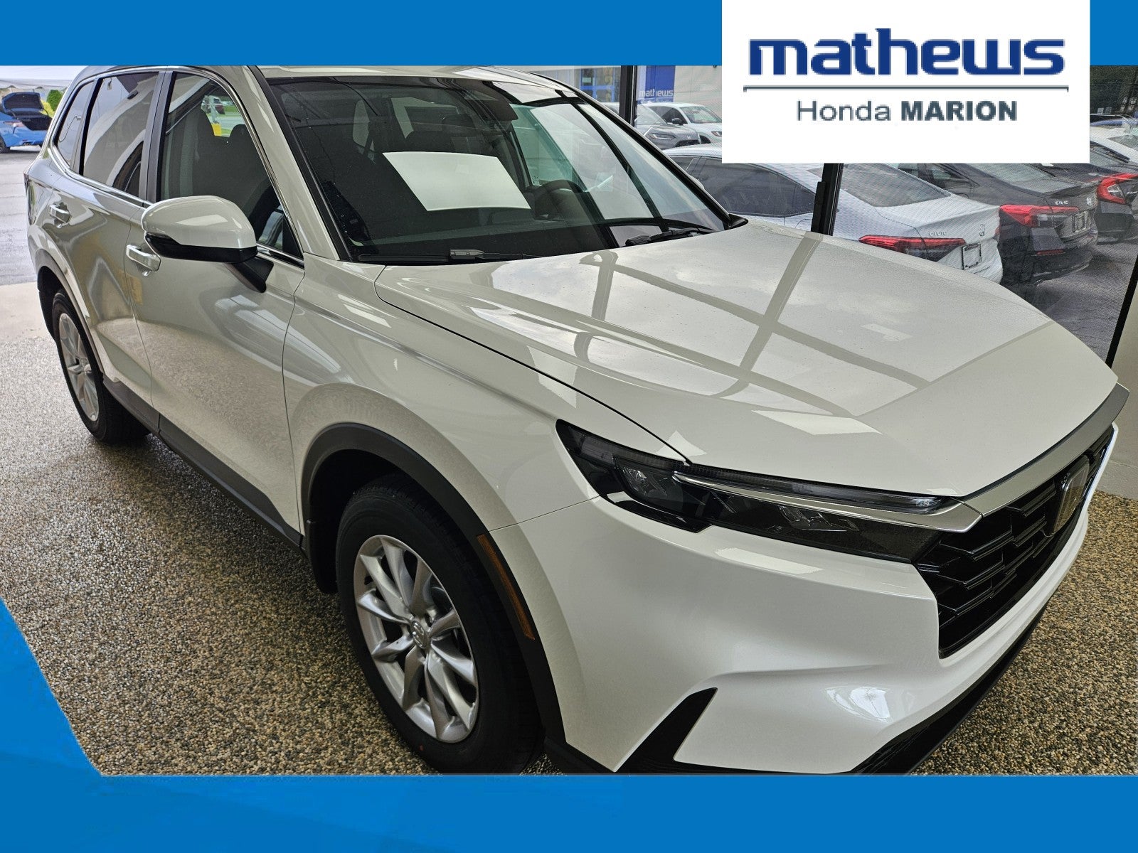 2026 Honda CR-V AWD EX in Platinum White Pearl — front three-quarter view