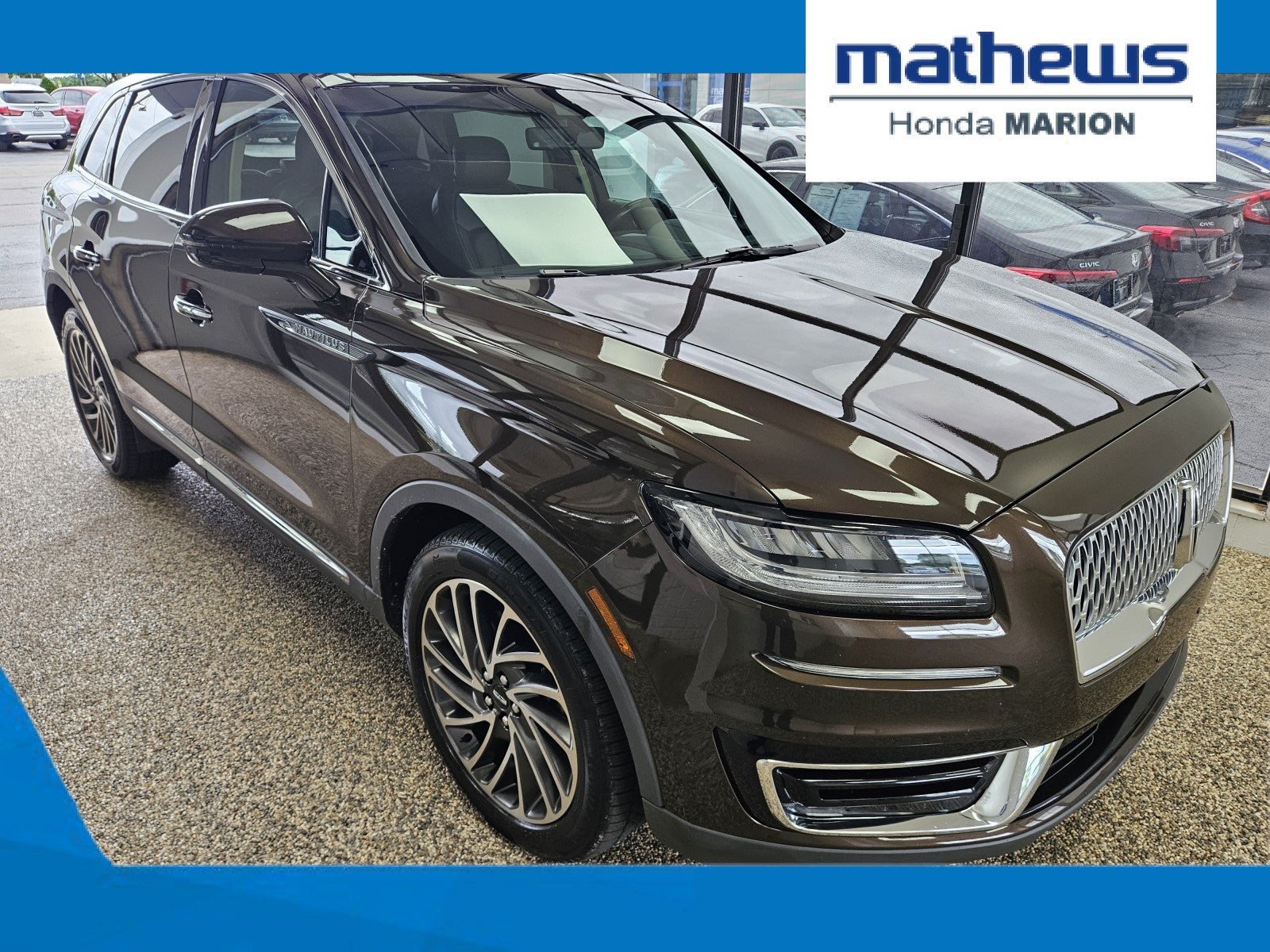 2019 Lincoln Nautilus Reserve in Ochre Brown Metallic — front three-quarter view