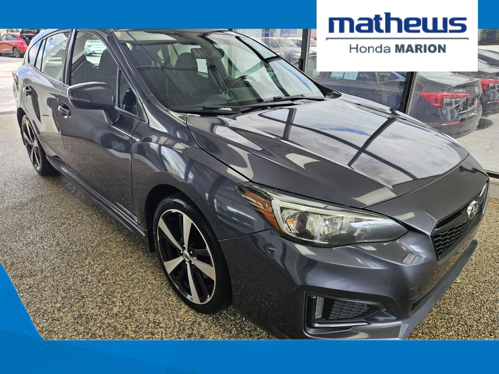 2017 Subaru Impreza Sport in Lapis Blue Pearl — front three-quarter view