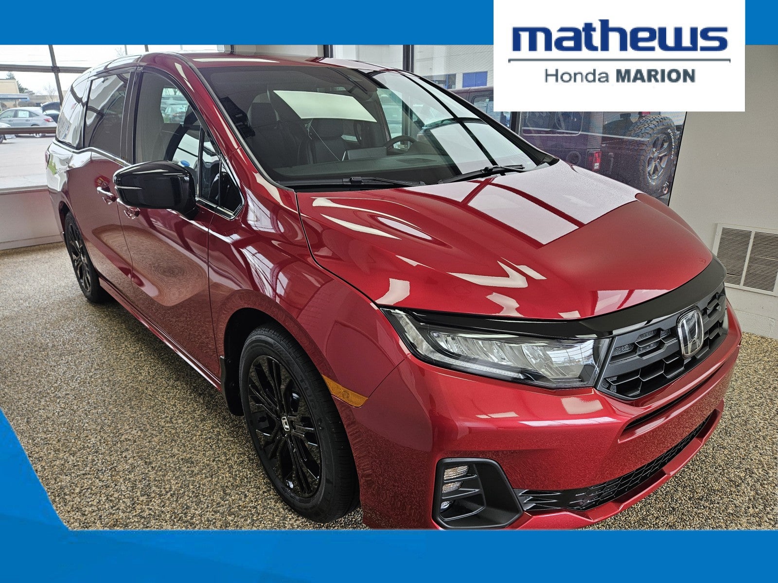 2026 Honda Odyssey Sport-L in Radiant Red Metallic II — front three-quarter view