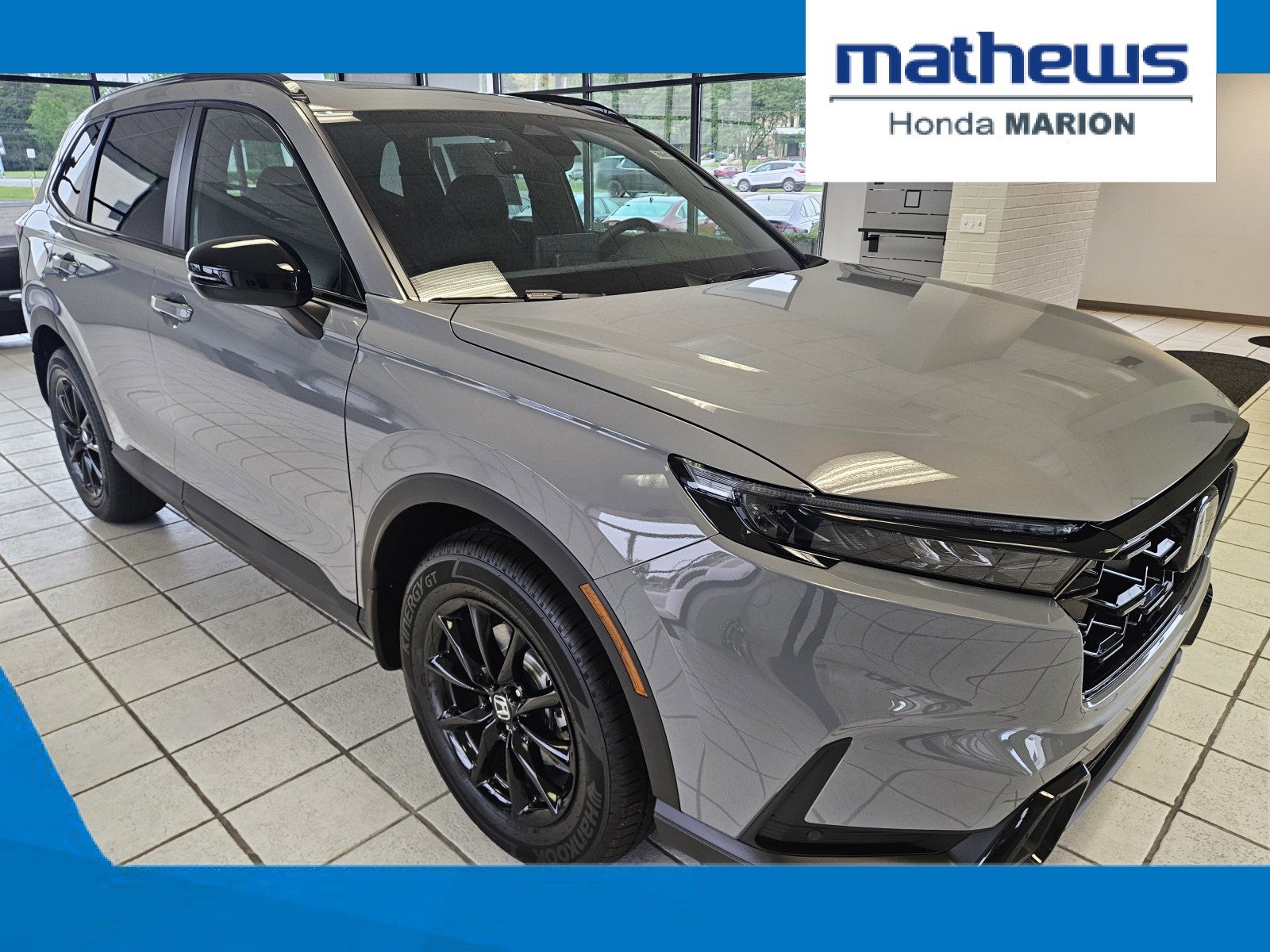 2026 Honda CR-V AWD Sport-L Hybrid in Urban Gray Pearl — front three-quarter view