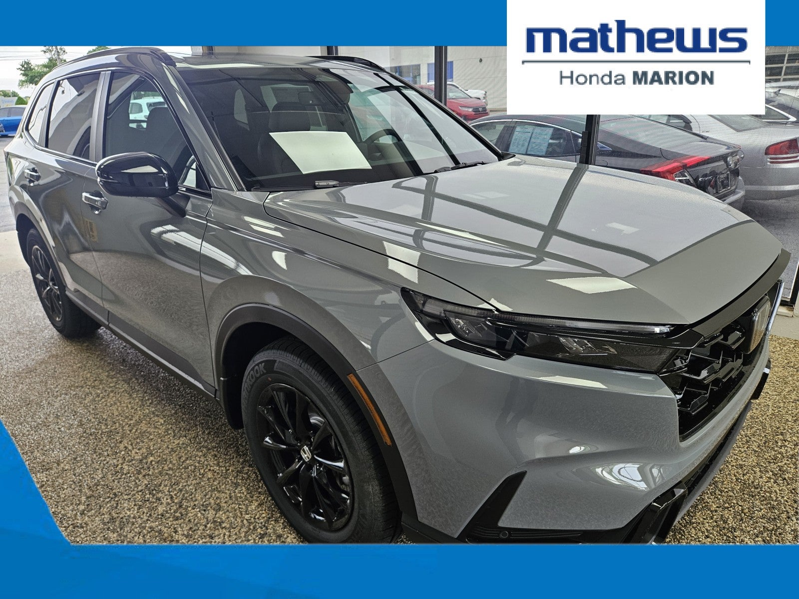 2026 Honda CR-V AWD Sport-L Hybrid in Urban Gray Pearl — front three-quarter view
